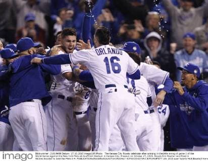 The Kansas City Royals celebrate after winning in the14th inning of game 1 of the World Series against the New York Mets at Kauffman Stadium in Kansas City, Missouri on October 27, 2015. Royals Eric Hosmer sacrificed in Alcides Escobar to beat the Mets 5-4.  KCP20151027243 JEFFxMOFFETT