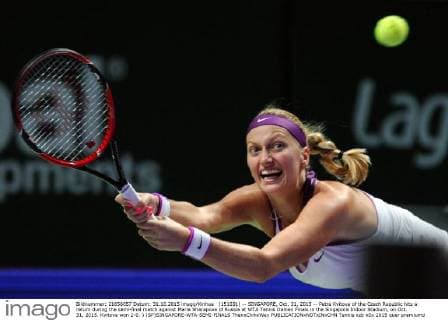 (151031) -- SINGAPORE, Oct. 31, 2015 -- Petra Kvitova of the Czech Republic hits a return during the semi-final match against Maria Sharapova of Russia at WTA Tennis Damen Finals in the Singapore Indoor Stadium, on Oct. 31, 2015. Kvitova won 2-0. ) (SP)SINGAPORE-WTA-SEMI-FINALS ThenxChihxWey 