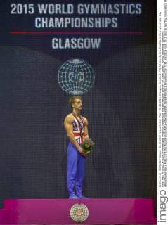 31.10.2015. Glasgow, Scotland. FIG Artistic Gymnastics World Championships. Day Nine. Max WHITLOCK (GBR) Pommel gold Medallist listening to the the national anthem of Great Britain during the medal ceremony . xRolandxHarrisonx  ActionPlus11677851