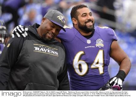 Baltimore Ravens guard John Urschel (64) shares a smile during warmups for their football game against the San Diego Chargers at M&T Bank Stadium in Baltimore, November 1, 2015.  BAL2015110103 DAVIDxTULIS