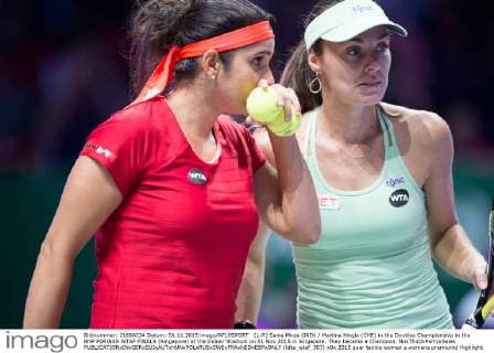 (L-R) Sania Mirza (IND) Martina Hingis (CHE) in the Doubles Championship in the BNP PARIBAS WTAF FINALS (Singapore) at the Indoor Stadium on 01 Nov 2015 in Singapore. They became a Champion. NoxThirdxPartyxSales  (ldta_wtaf_307)