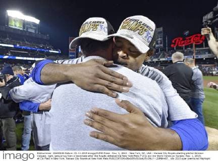Nov. 1, 2015 - New York, NY, USA - Kansas City Royals starting pitcher Edinson Volquez, right, gets a hug from a teammate after the Royals defeated the New York Mets 7-2 to win the World Series on Sunday, Nov. 1, 2015, at Citi Field in New York. Kansas City Royals at New York Mets - ZUMAm67_