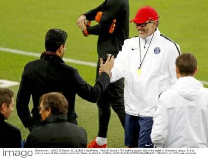 Paris St Germain PSG training session before the match of Champions League. In this picture, Laurent Blanc shakes hands with Nasser Al-Khelaifi. xJOSExA.xGARCIAx 