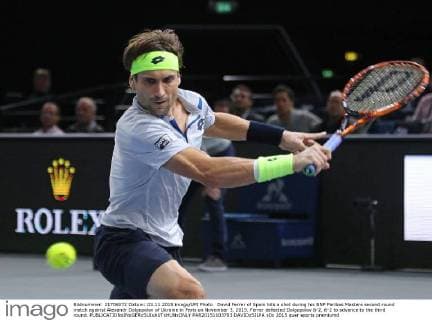David Ferrer of Spain hits a shot during his BNP Paribas Masters second round match against Alexandr Dolgopolov of Ukraine in Paris on November 3, 2015. Ferrer defeated Dolgopolov 6-2, 6-2 to advance to the third round.  PAR20151103703 DAVIDxSILPA