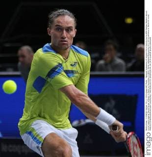 Alexandr Dolgopolov of Ukraine hits a shot during his BNP Paribas Masters second round match against David Ferrer of Spain in Paris on November 3, 2015. Ferrer defeated Dolgopolov 6-2, 6-2 to advance to the third round.  PAR20151103711 DAVIDxSILPA