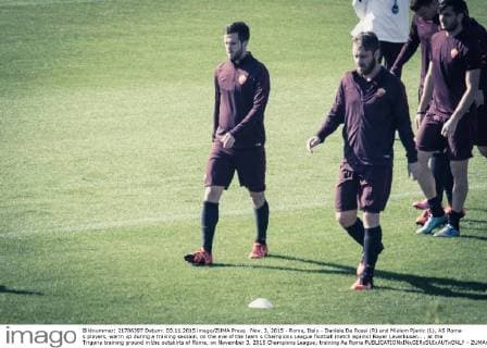Nov. 3, 2015 - Rome, Italy - Daniele De Rossi (R) and Mialem Pjanic (L), AS Roma s players, warm up during a training session, on the eve of the team s Champions League football match against Bayer Leverkusen.. , at the Trigoria training ground in the outskirts of Rome, on November 3, 2015 Champions League; training As Roma  - ZUMAn230
