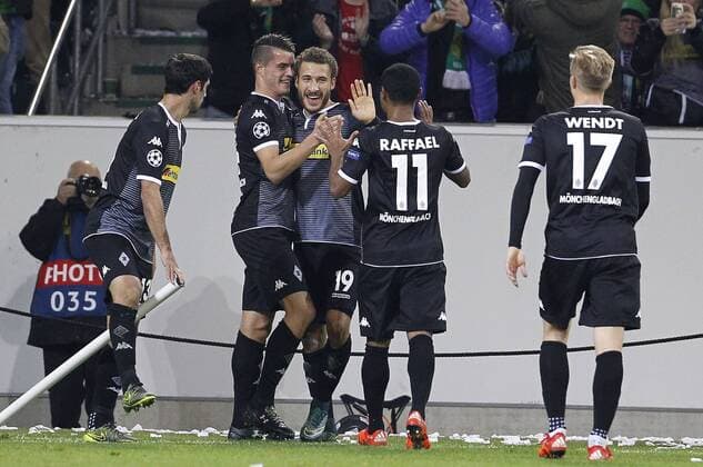 Fabian Johnson (Bor. Moenchengladbach) (M) celebrates scoring the 1:0 goal with Granit Xhaka (Bor. Moenchengladbach) (L) and Raffael (Bor. Moenchengladbach) (11) during the Championsleague match between Borussia Moenchengladbach and Juventus Turin, Borussiapark in Moenchengladbach on November 3., 2015. Borussia Mönchengladbach vs. Juventus Turin in der Champions League der Saison 2015 2016 am 3. November 2015.
