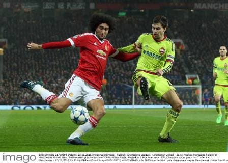 Fußball, Champions League, Manchester United - ZSKA Moskau Marouane Fellaini of Manchester United ManU battles Georgi Schennikov of CSKA - Manchester United vs CSKA Moscow - UEFA Champion s League - Old Trafford - Manchester - 03 11 2015 Pic Philip Oldham SportImage EDITORIAL USE ONLY. No use with unauthorised audio, video, data, fixture lists, club league logos or live services. Online in-match use limited to 120 images, no video emulation. No use in betting, games or single club league player publications.