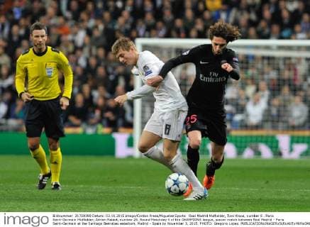 Real Madrid Midfielder, Toni Kroos, number 8 . Paris Saint-Germain Midfielder, Adrien Rabiot, number 25. Round Matchday 4 of the CHAMPIONS league, soccer match between Real Madrid - Paris Saint-Germain at the Santiago Bernabeu estadium, Madrid - Spain by November 3, 2015. PHOTO: Gregorio Lopez. 