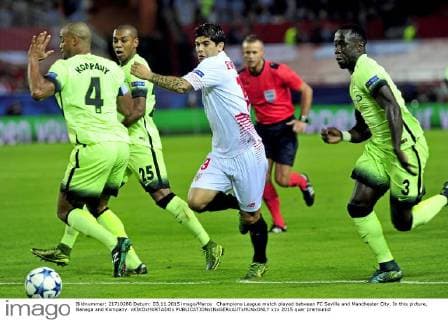 Champions League match played between FC Sevilla and Manchester City. In this picture, Banega and Kompany. xKIKOxHURTADOx 