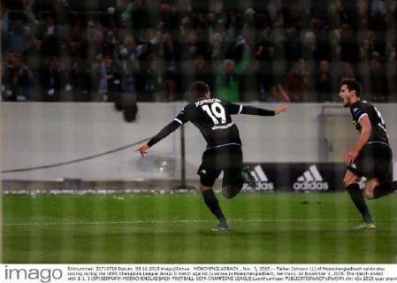 MÖNCHENGLADBACH , Nov. 3, 2015 -- Fabian Johnson (L) of Moenchengladbach celebrates scoring during the UEFA Champions League Group D match against Juventus in Moenchengladbach, Germany, on November 3, 2015. The match ended with 1-1. ) (SP)GERMANY-MOENCHENGLADBACH-FOOTBALL-UEFA CHAMPIONS LEAGUE LuoxHuanhuan 