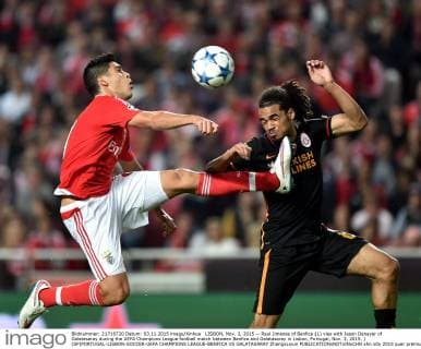 LISBON, Nov. 3, 2015 -- Raul Jimenez of Benfica (L) vies with Jason Denayer of Galatasaray during the UEFA Champions League football match between Benfica and Galatasaray in Lisbon, Portugal, Nov. 3, 2015. ) (SP)PORTUGAL-LISBON-SOCCER-UEFA CHAMPIONS LEAGUE-BENFICA VS GALATASARAY ZhangxLiyun 