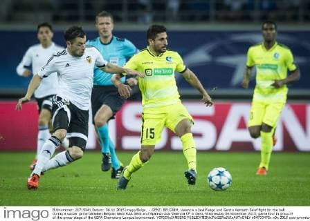 - GENT, BELGIUM: Valencia s Javi Fuego and Gent s Kenneth Saief fight for the ball during a soccer game between Belgian team KAA Gent and Spanish club Valencia CF in Gent, Wednesday 04 November 2015, game four in group H of the group stage of the UEFA Champions League tournament. YORICKxJANSENS  x04733475x