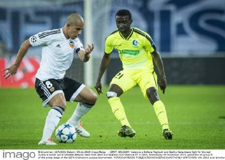 - GENT, BELGIUM: Valencia s Sofiane Feghouli and Gent s Nana Asare fight for the ball during a soccer game between Belgian team KAA Gent and Spanish club Valencia CF in Gent, Wednesday 04 November 2015, game four in group H of the group stage of the UEFA Champions League tournament. YORICKxJANSENS  x04733495x