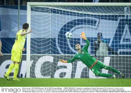 - GENT, BELGIUM: Valencia s goalkeeper Jaume Domenech (R) pictured in action as 14 Gent s Sven Kums (L) scores from penalty during a soccer game between Belgian team KAA Gent and Spanish club Valencia CF in Gent, Wednesday 04 November 2015, game four in group H of the group stage of the UEFA Champions League tournament. YORICKxJANSENS  x04733538x