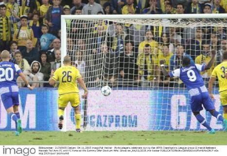 Porto players celebrate during the UEFA Chanmpions League group G match between Maccabi Tel-Aviv FC and FC Porto at the Sammy Ofer Stadium Hifa- Israel on ,04 11 2015 nir keidar 