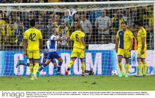 Porto players celebrate during the UEFA Chanmpions League group G match between Maccabi Tel-Aviv FC and FC Porto at the Sammy Ofer Stadium Hifa- Israel on ,04 11 2015 nir keidar 