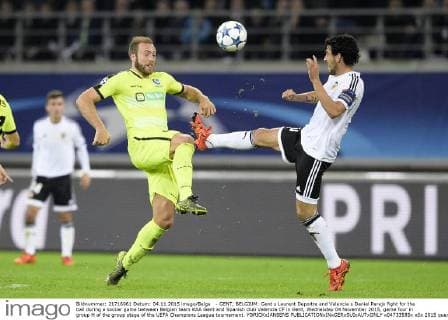 - GENT, BELGIUM: Gent s Laurent Depoitre and Valencia s Daniel Parejo fight for the ball during a soccer game between Belgian team KAA Gent and Spanish club Valencia CF in Gent, Wednesday 04 November 2015, game four in group H of the group stage of the UEFA Champions League tournament. YORICKxJANSENS  x04733585x
