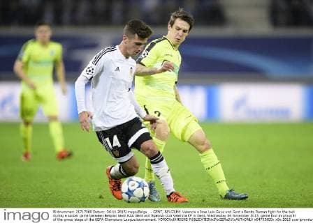 - GENT, BELGIUM: Valencia s Jose Luis Gaya and Gent s Benito Raman fight for the ball during a soccer game between Belgian team KAA Gent and Spanish club Valencia CF in Gent, Wednesday 04 November 2015, game four in group H of the group stage of the UEFA Champions League tournament. YORICKxJANSENS  x04733600x