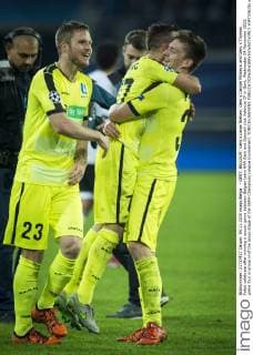 - GENT, BELGIUM: Gent s Lasse Nielsen, Gent s Danijel Milicevic and Gent s Thomas Foket celebrate after winning a soccer game between Belgian team KAA Gent and Spanish club Valencia CF in Gent, Wednesday 04 November 2015, game four in group H of the group stage of the UEFA Champions League tournament. YORICKxJANSENS  x04733633x