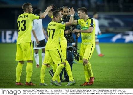 - GENT, BELGIUM: Gent s Lasse Nielsen, Gent s Danijel Milicevic and Gent s Thomas Foket celebrate after winning a soccer game between Belgian team KAA Gent and Spanish club Valencia CF in Gent, Wednesday 04 November 2015, game four in group H of the group stage of the UEFA Champions League tournament. YORICKxJANSENS  x04733645x