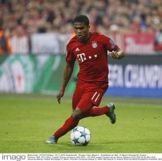 Douglas Costa (Bayern) . Einzelaktion am Ball . FC Bayern München-FC Arsenal . München, GER, 04.11.2015, Fussball-Champions League 2015-2016 .