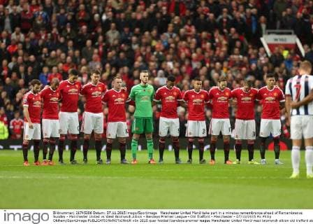 Manchester United ManU take part in a minutes remembrance ahead of Remembrance Sunday - Manchester United vs West Bromwich Albion - Barclays Premier League - Old Trafford - Manchester - 07 11 2015 Pic Philip Oldham SportImage EDITORIAL USE ONLY. No use with unauthorised audio, video, data, fixture lists, club league logos or live services. Online in-match use limited to 120 images, no video emulation. No use in betting, games or single club league player publications.