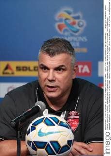 DUBAI, UNITED ARAB EMIRATES - NOVEMBER 07: (CHINA OUT) Aurelian Cosmin Olaroiu, head coach of Al Ahli, attends a press conference PK Pressekonferenz after the first leg of the AFC Champions League final match between Al Ahli and Guangzhou Evergrande at the Al-Rashid Stadium on November 7, 2015 in Dubai, United Arab Emirates.  CFP475536723 