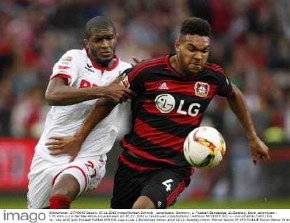 Leverkusen, Germany, 1. Fussball-Bundesliga, 12.Spieltag, Bayer Leverkusen : 1.FC Köln 1-2 in der Bay-Arena in Leverkusen am 07.11. 2015 in Leverkusen Deutschland ; Anthony MODESTE (FC) li.- und Jonathan TAH (LEV) re.-