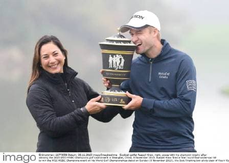 Scottish golfer Russell Knox, right, poses with his champion trophy after winning the 2015 WGC-HSBC Champions golf tournament in Shanghai, China, 8 November 2015. Russell Knox fired a final round four-under-par 68 to win the WGC-HSBC Champions event on his World Golf Championships debut on Sunday (8 November 2015), the Scot finishing two shots clear of Kevin Kisner at the Sheshan International Golf Club. The only player not to complete his third round in fading light on Saturday, Knox returned to the course early on Sunday and birdied the par-five 18th to join American Kisner at the top of the leaderboard after 54 holes. The 30-year-old then used some supreme wedge play to offset two bogeys with six birdies on his way to a 20-under 268 total to become the first Scot to win a WGC event and also the first debutant to claim victory since Jeff Maggert in 1999. Knox springs Shanghai surprise for maiden WGC win  pbu358008_101
