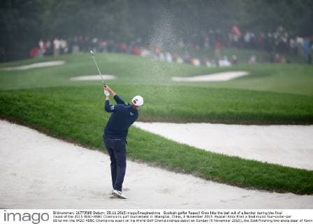 Scottish golfer Russell Knox hits the ball out of a bunker during the final round of the 2015 WGC-HSBC Champions golf tournament in Shanghai, China, 8 November 2015. Russell Knox fired a final round four-under-par 68 to win the WGC-HSBC Champions event on his World Golf Championships debut on Sunday (8 November 2015), the Scot finishing two shots clear of Kevin Kisner at the Sheshan International Golf Club. The only player not to complete his third round in fading light on Saturday, Knox returned to the course early on Sunday and birdied the par-five 18th to join American Kisner at the top of the leaderboard after 54 holes. The 30-year-old then used some supreme wedge play to offset two bogeys with six birdies on his way to a 20-under 268 total to become the first Scot to win a WGC event and also the first debutant to claim victory since Jeff Maggert in 1999. Knox springs Shanghai surprise for maiden WGC win  pbu358008_17