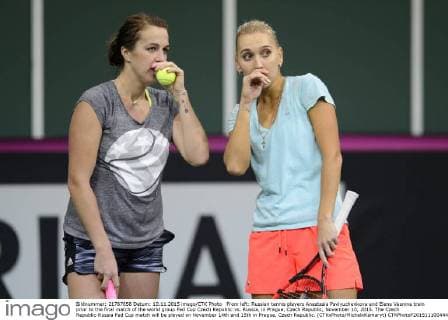 From left: Russian tennis players Anastasia Pavlyuchenkova and Elena Vesnina train prior to the final match of the world group Fed Cup Czech Republic vs. Russia, in Prague, Czech Republic, November 10, 2015. The Czech Republic-Russia Fed Cup match will be played on November 14th and 15th in Prague, Czech Republic. (CTKxPhoto MichalxKamaryt) CTKPhotoP201511100444001  kmt 3