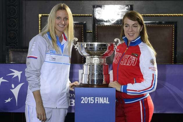 Czech Team tennis player Petra Kvitova (left) and Anastasija Pavljucenkovova from Russia pose with trophy for winner. Tennis draw of Fed Cup final 2015, Czech Republic - Russia takes place at Old Town Hall in Prague, Czech Republic, November 13, 2015. The Czech Republic-Russia Fed Cup match will be played on November 14th and 15th in Prague, Czech Republic. (CTKxPhoto MichalxKamaryt) CTKPhotoP201511130606301  kmt 4