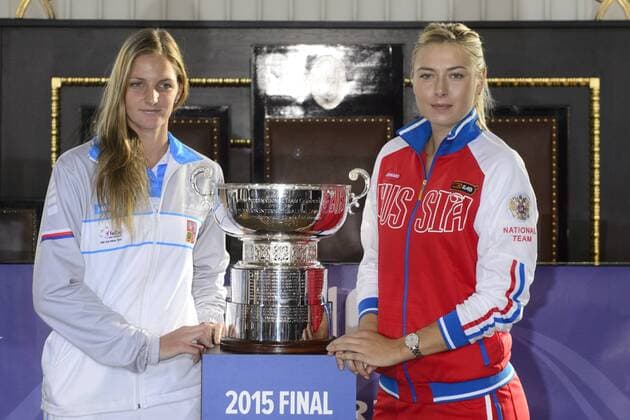 Czech Team tennis player Karolina Pliskova (left) and Maria Sarapovova from Russia pose with trophy for winner. Tennis draw of Fed Cup final 2015, Czech Republic - Russia takes place at Old Town Hall in Prague, Czech Republic, November 13, 2015. The Czech Republic-Russia Fed Cup match will be played on November 14th and 15th in Prague, Czech Republic. (CTKxPhoto MichalxKamaryt) CTKPhotoP201511130606401  kmt 5