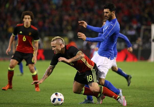 - BRUSSELS, BELGIUM: Belgium s Radja Nainggolan and Italy s Roberto Soriano fight for the ball during a friendly soccer game between Belgian national team Nationalteam Red Devils and Italy, in Brussels, Friday 13 November 2015, a game in preparation of the Euro2016 European Championship EM Europameisterschaft VIRGINIExLEFOUR  x04739876x