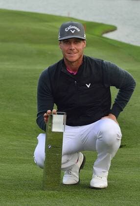 Nov. 15, 2015 - Shanghai, People s Republic of China - KRISTOFFER BROBERG of Sweden poses with the trophy after winning the BMW Masters at Lake Malaren Golf Club in Shanghai. Golf 2015 - Shanghai Masters - Day 4  - ZUMAm119