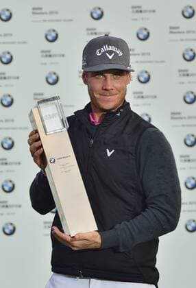 Nov. 15, 2015 - Shanghai, People s Republic of China - KRISTOFFER BROBERG of Sweden poses with the trophy after winning the BMW Masters at Lake Malaren Golf Club in Shanghai. Golf 2015 - Shanghai Masters - Day 4  - ZUMAm119