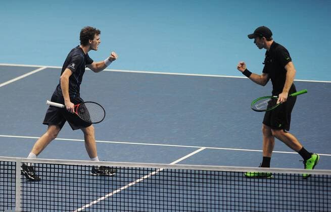 Tennis - 2015 ATP Tennis Herren World Tour Finals at The O2 - Day One Group :Ashe Smith :Mens Doubles : Jamie Murray (GBR) and John Peers (AUS) vs. Simone Bolelli and Fabio Fognini (Italy) Jamie Murray and John Peers celebrate their win COLORSPORT ANDREW COWIE 