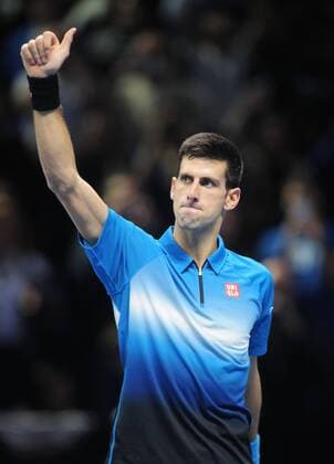 Tennis - 2015 ATP Tennis Herren World Tour Finals at The O2 - Day One Group : Stan Smith : Mens singles : Novak Djokovic (Serb) vs. Kai Nishikori (Jap) Novak Djokovic after his win over Nishikori COLORSPORT ANDREW COWIE 