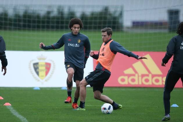 - BRUSSELS, BELGIUM: Belgium s Axel Witsel and Belgium s Jan Vertonghen fight for the ball during a training session of the Red Devils, the Belgian national soccer team, Sunday 15 November 2015, in Brussels. Next Tuesday the team plays against Spain in preparation of Euro2016. BRUNOxFAHY  x04740919x