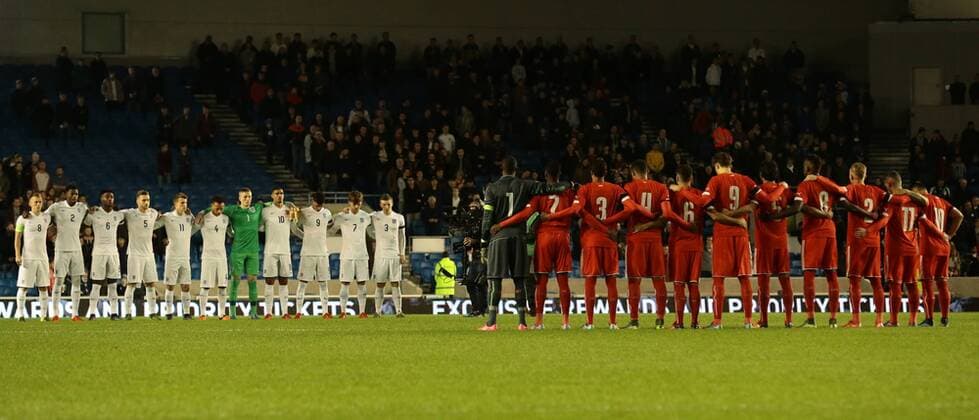 16.11.2015. Amex Stadium, Brighton, England. Euro U21 U 21 Championship Qualifying. England U21 versus Switzerland U21. Both teams observe a minutes silence remembering those who suffered during the tragic events in Paris on November 11th xMarkxKertonx  ActionPlus11682195