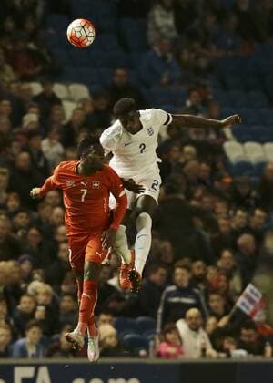 16.11.2015. Amex Stadium, Brighton, England. Euro U21 U 21 Championship Qualifying. England U21 versus Switzerland U21. Dominic Iorfa of England wins a header against Lopes Garcia of Switzerland xMarkxKertonx  ActionPlus11682197