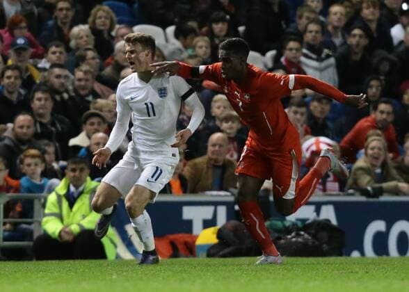 16.11.2015. Amex Stadium, Brighton, England. Euro U21 U 21 Championship Qualifying. England U21 versus Switzerland U21. Solly March of England is fouled by Lopes Garcia of Switzerland and awarded a free kick xMarkxKertonx  ActionPlus11682199