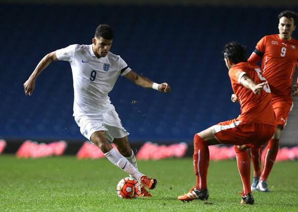 16.11.2015. Amex Stadium, Brighton, England. Euro U21 U 21 Championship Qualifying. England U21 versus Switzerland U21. Dominic Solanke of England takes the ball round Levent Gulen of Switzerland xMarkxKertonx  ActionPlus11682208