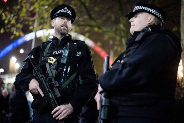 Armed police outside the stadium - Breast Cancer Care International - England v France - Wembley Stadium - London - England - 17th November 2015 - Picture Charlie Forgham Bailey Sportimage EDITORIAL USE ONLY. No use with unauthorised audio, video, data, fixture lists, club league logos or live services. Online in-match use limited to 120 images, no video emulation. No use in betting, games or single club league player publications.