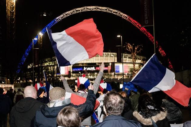France flags outside the stadium - Breast Cancer Care International - England v France - Wembley Stadium - London - England - 17th November 2015 - Picture Charlie Forgham Bailey Sportimage EDITORIAL USE ONLY. No use with unauthorised audio, video, data, fixture lists, club league logos or live services. Online in-match use limited to 120 images, no video emulation. No use in betting, games or single club league player publications.