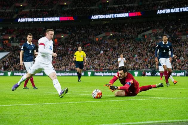 England s Wayne Rooney and France?s Hugo Lloris - Breast Cancer Care International - England v France - Wembley Stadium - London - England - 17th November 2015 - Picture Charlie Forgham Bailey Sportimage EDITORIAL USE ONLY. No use with unauthorised audio, video, data, fixture lists, club league logos or live services. Online in-match use limited to 120 images, no video emulation. No use in betting, games or single club league player publications.