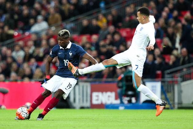 France?s Paul Pogba and England?s Dele Alli - Breast Cancer Care International - England v France - Wembley Stadium - London - England - 17th November 2015 - Picture Charlie Forgham Bailey Sportimage EDITORIAL USE ONLY. No use with unauthorised audio, video, data, fixture lists, club league logos or live services. Online in-match use limited to 120 images, no video emulation. No use in betting, games or single club league player publications.