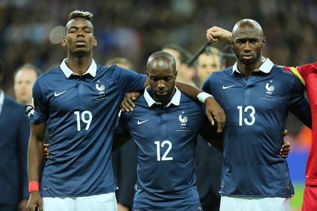 France s Paul Pogba, Lassana Diarra and Eliaquim Mangala look on dejected during the national anthem International Friendly Länderspiel Match- England v France - Wembley Stadium - England - 17th November 2015 - Picture David Klein Sportimage EDITORIAL USE ONLY. No use with unauthorised audio, video, data, fixture lists, club league logos or live services. Online in-match use limited to 120 images, no video emulation. No use in betting, games or single club league player publications.