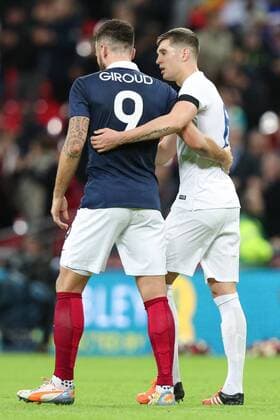 France?s Olivier Giroud and England s John Stones - Breast Cancer Care International - England v France - Wembley Stadium - London - England - 17th November 2015 - Picture Charlie Forgham Bailey Sportimage EDITORIAL USE ONLY. No use with unauthorised audio, video, data, fixture lists, club league logos or live services. Online in-match use limited to 120 images, no video emulation. No use in betting, games or single club league player publications.